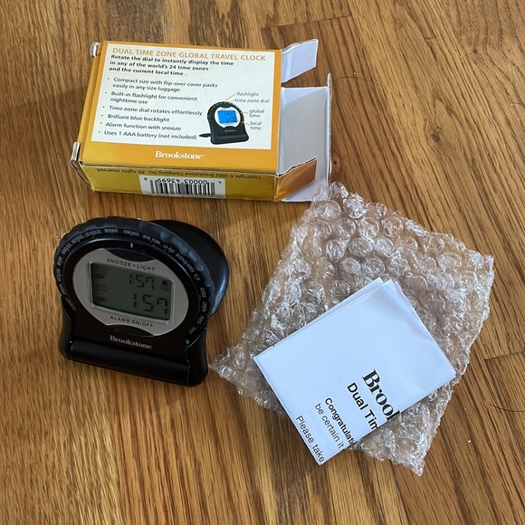 Brookstone Universal Voltage & Outlet Adapter & Dual Time Zone Clock - Picture 5 of 10